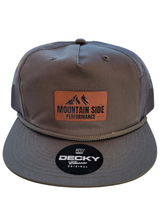 Load image into Gallery viewer, Mountain Side Performance Trucker Hat with Rectangle Patch
